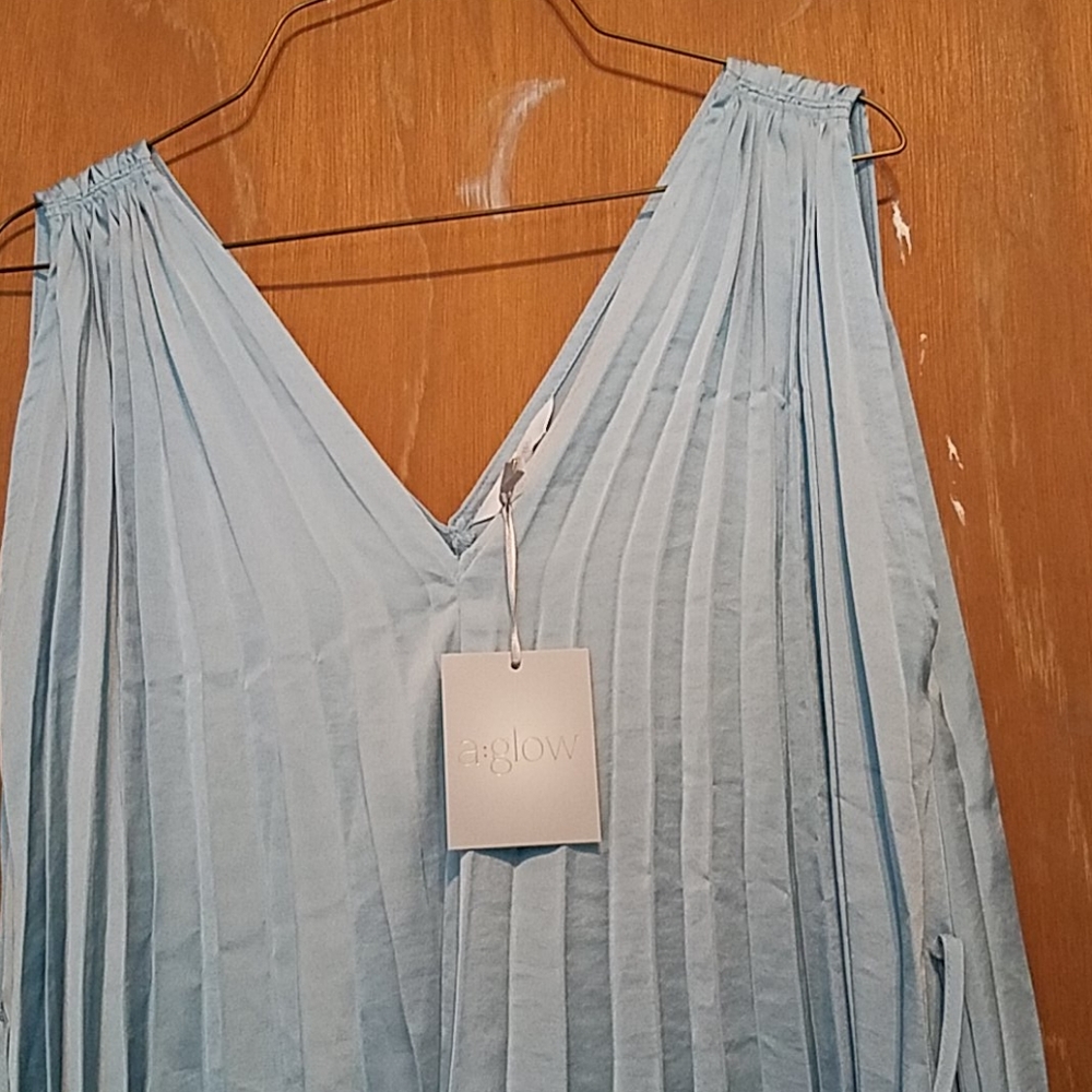 Dress A:Glow light blue. New with tags